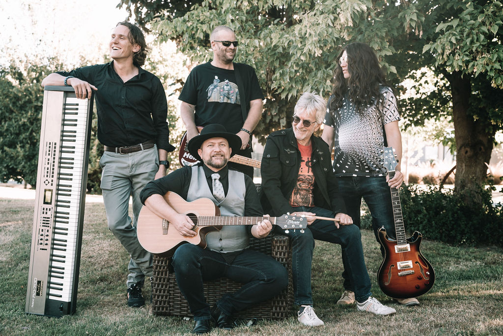 An Epic Picture of Bourbon Sour 5 piece Rock Band taken in Dalefield Near Queenstown by Dini Photography. It shows Bass Guitar Acoustic Drums Piano